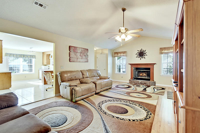 153 Iron Road Summerville, SC 29486 - Photo 7 of 28 Living room opens up to the kitchen