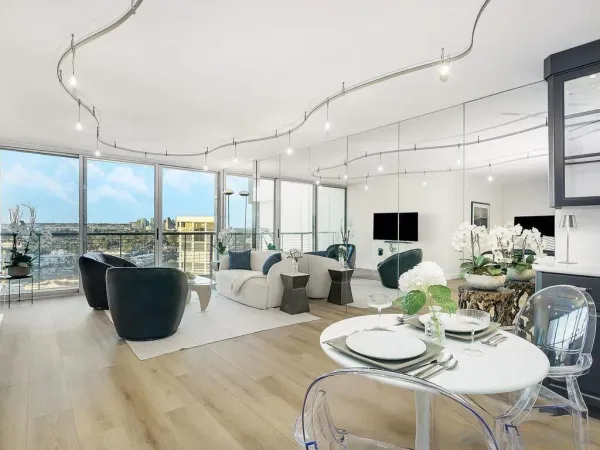 a living room with furniture and a large window