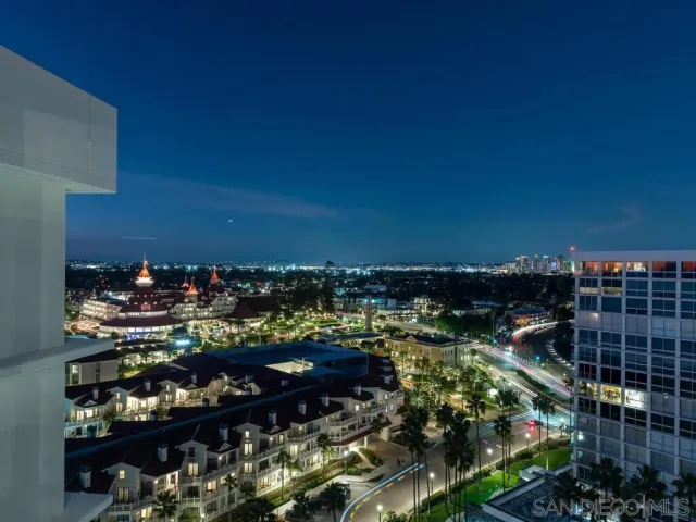 a view of a city with tall buildings
