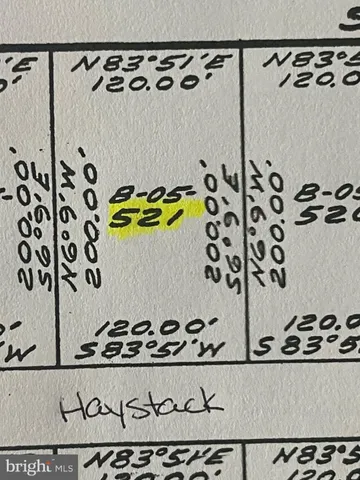 a bathroom with a bathtub and a shower curtain