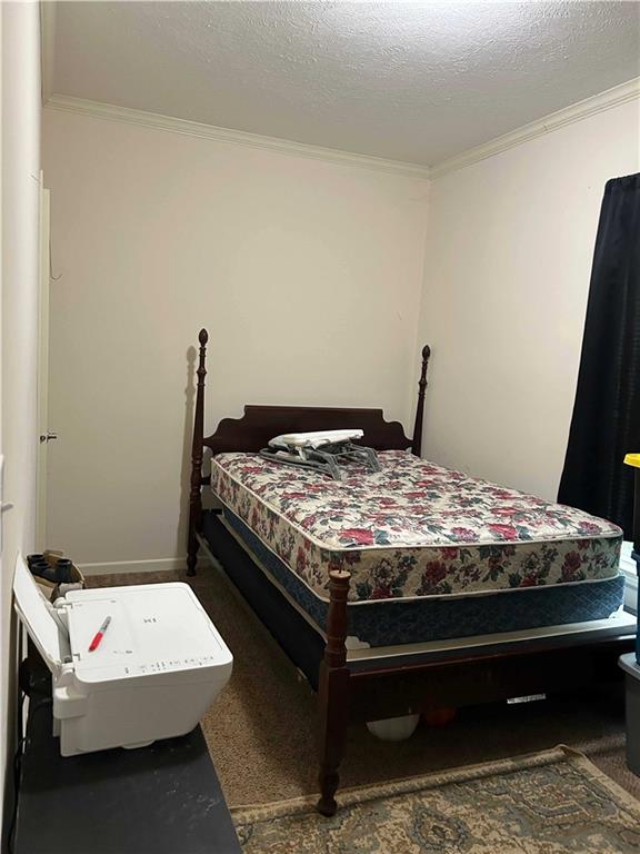 2477 Shoal Creek Road Colbert, GA 30628 - Photo 8 of 19 a bedroom with a bed and a table