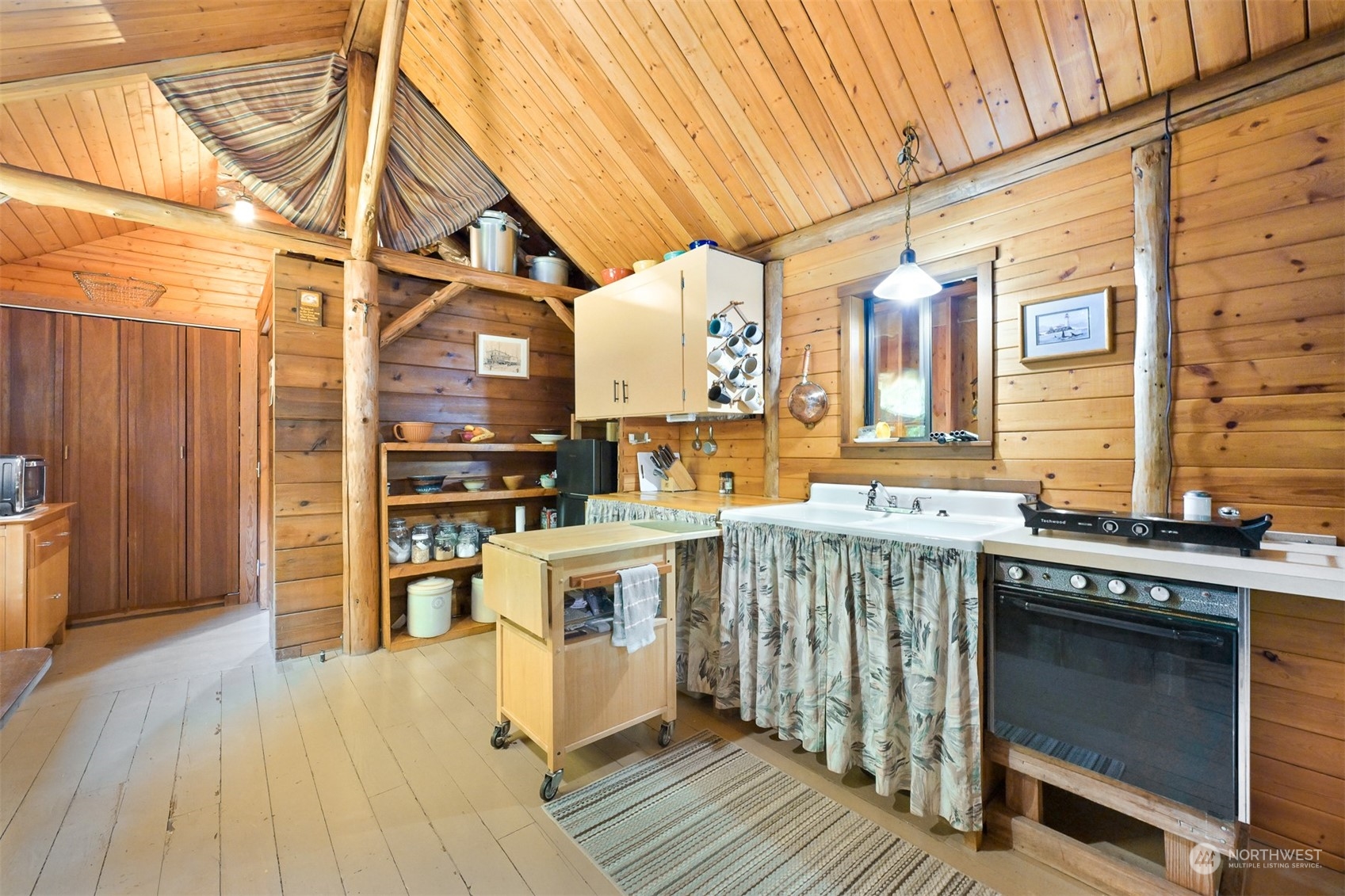 2125 Butler Creek Road Sedro-Woolley, WA 98284 - Photo 12 of 40 a kitchen with stainless steel appliances granite countertop a stove and a wooden cabinets