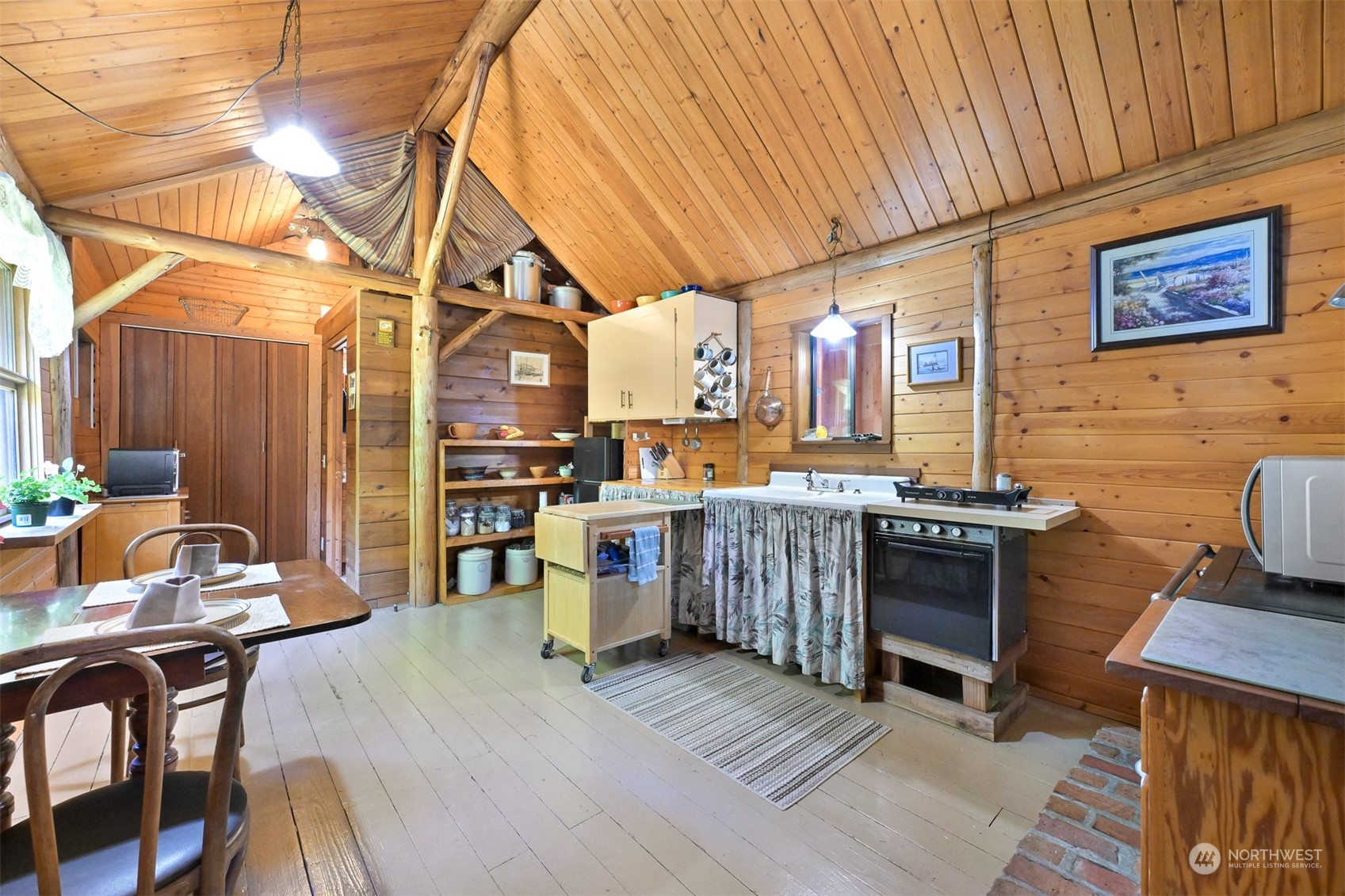 2125 Butler Creek Road Sedro-Woolley, WA 98284 - Photo 13 of 40 a kitchen with stainless steel appliances granite countertop a stove and a wooden cabinets