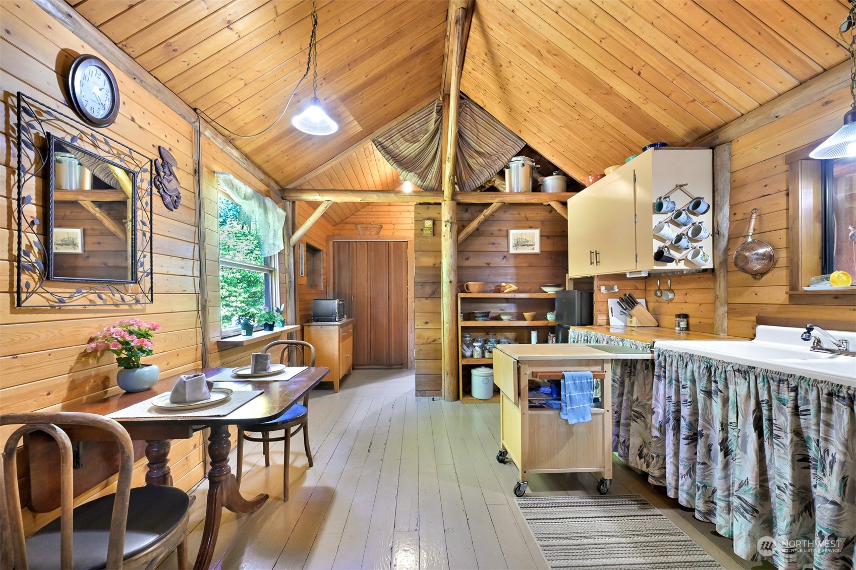 2125 Butler Creek Road Sedro-Woolley, WA 98284 - Photo 14 of 40 a view of a chairs and table in the patio