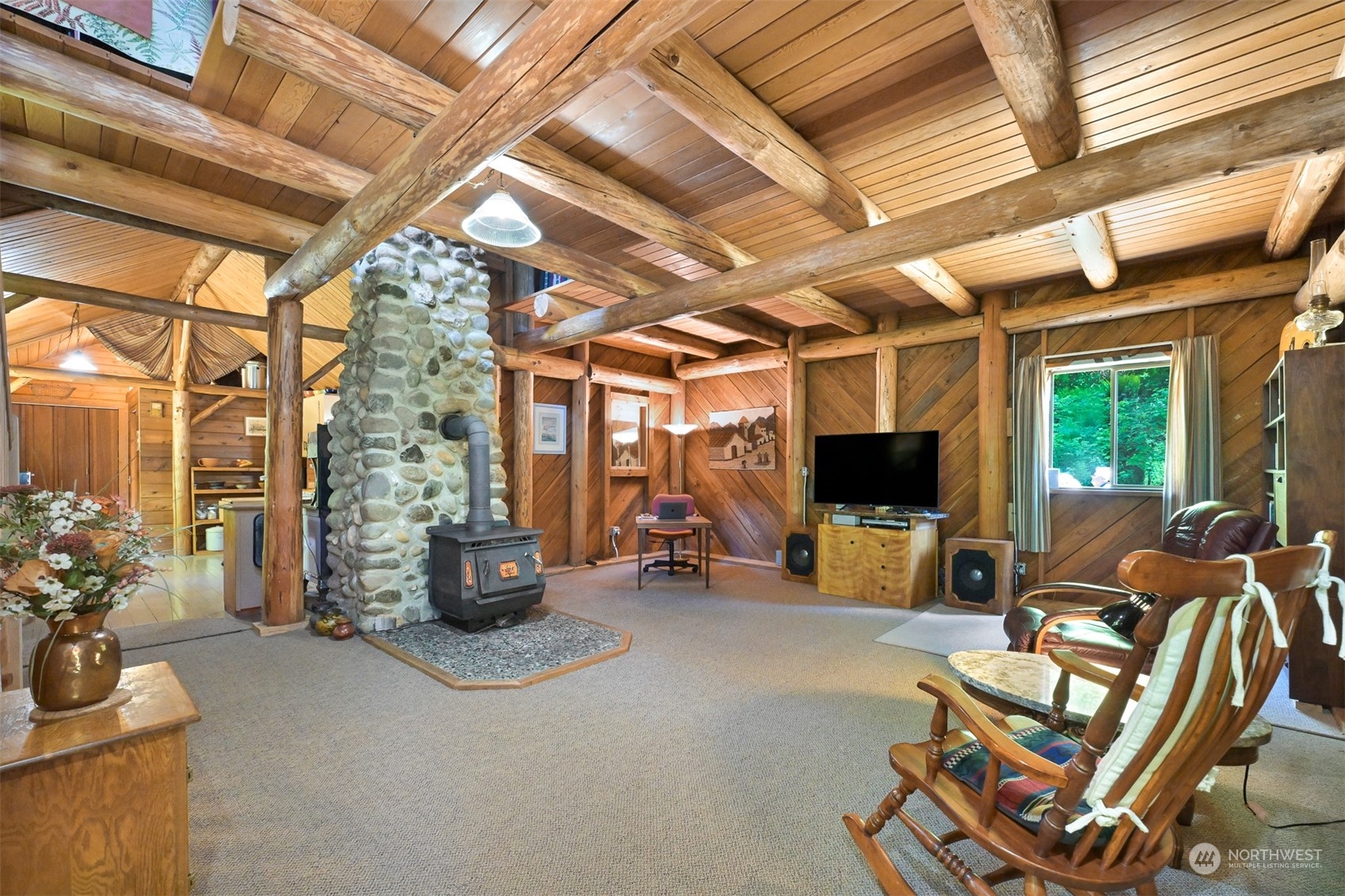2125 Butler Creek Road Sedro-Woolley, WA 98284 - Photo 21 of 40 a living room with furniture and a flat screen tv