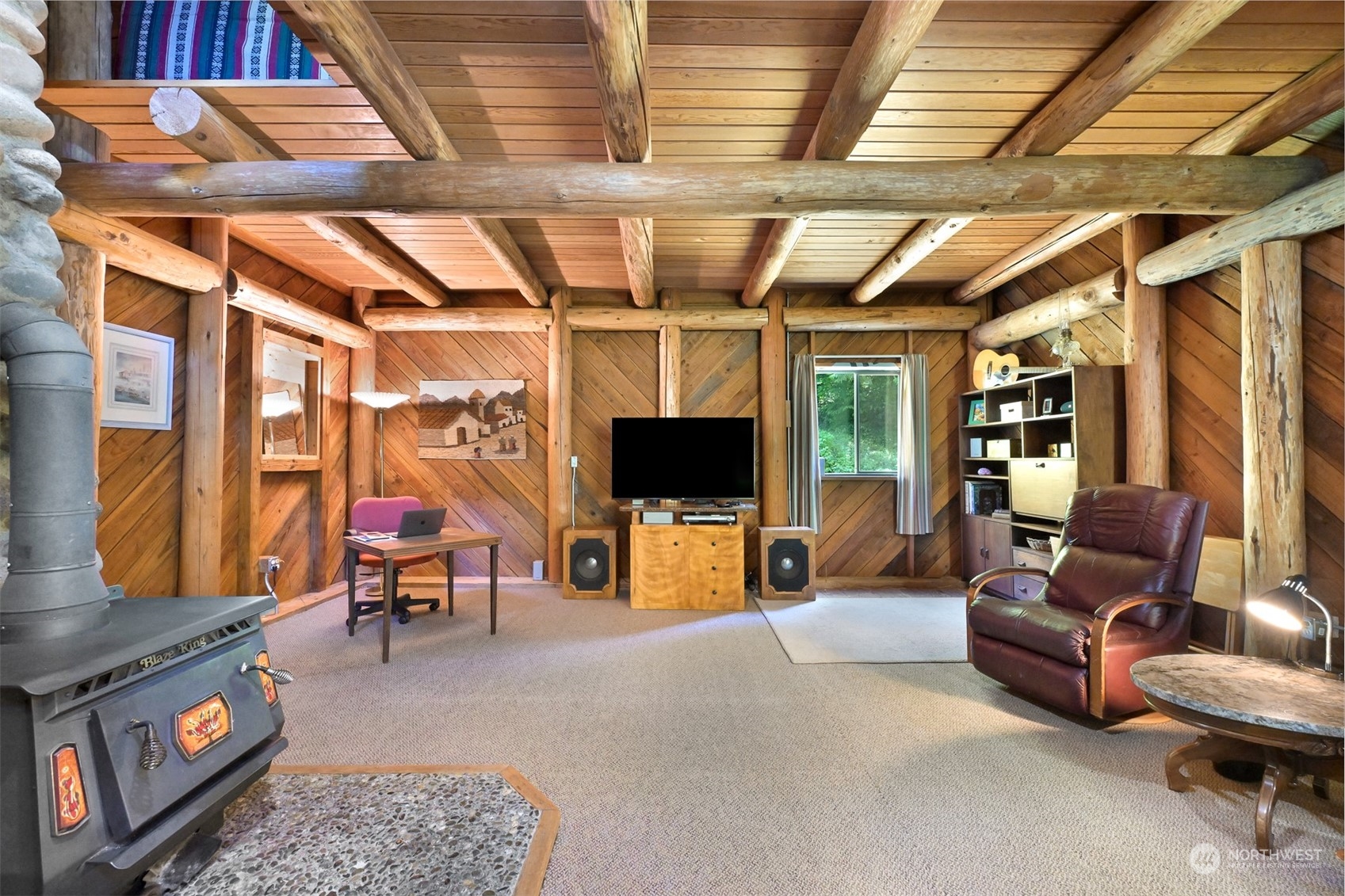 2125 Butler Creek Road Sedro-Woolley, WA 98284 - Photo 22 of 40 a living room with furniture and a flat screen tv