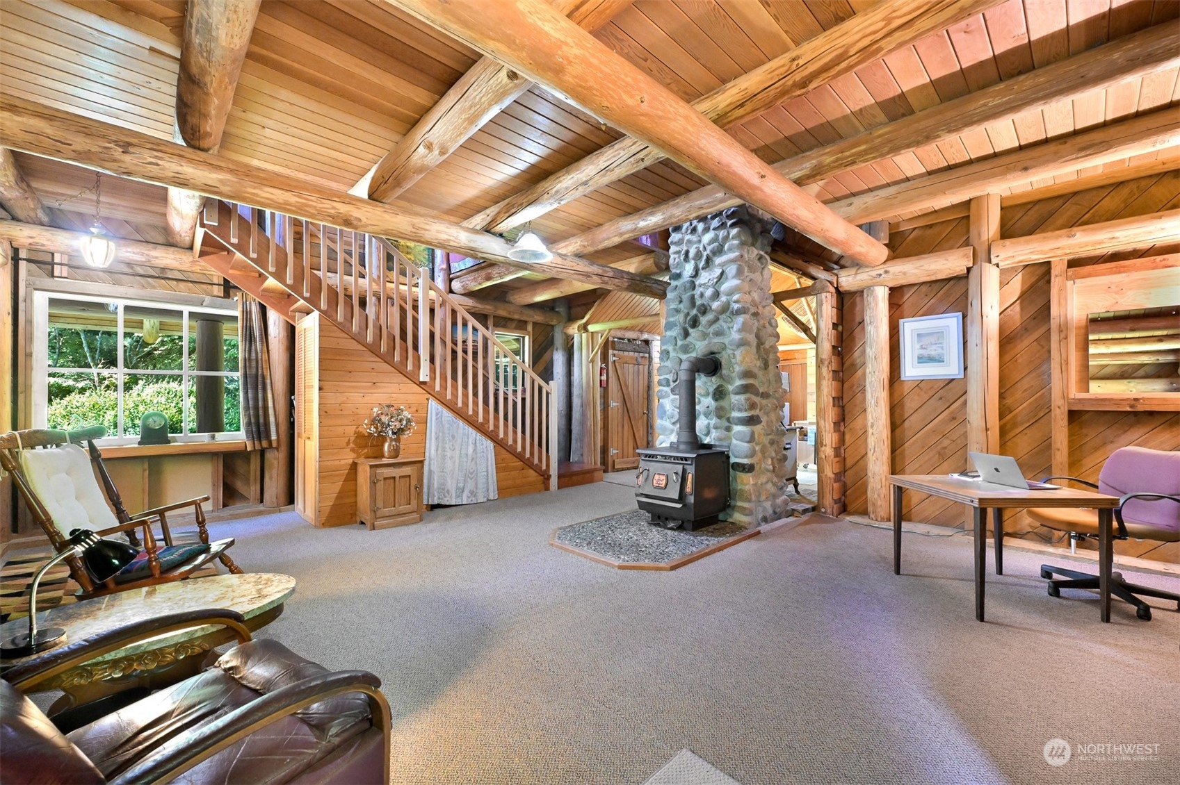 2125 Butler Creek Road Sedro-Woolley, WA 98284 - Photo 23 of 40 a living room with furniture and a flat screen tv