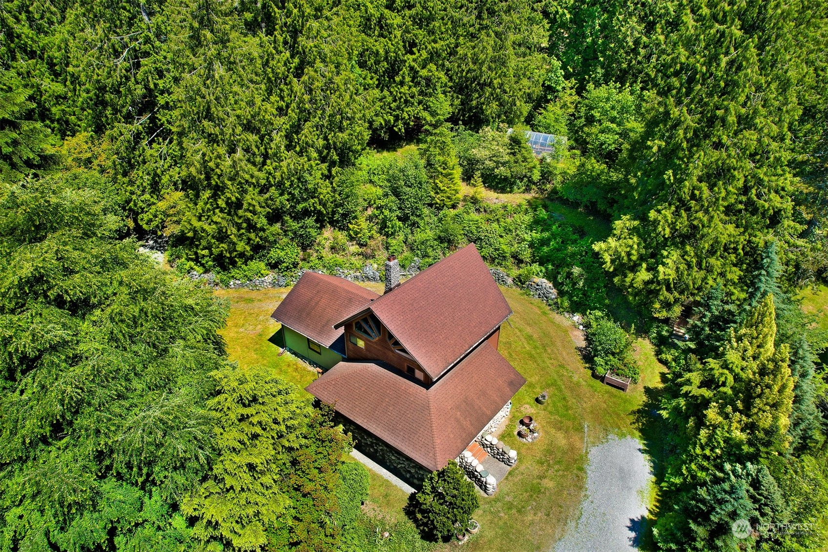 2125 Butler Creek Road Sedro-Woolley, WA 98284 - Photo 31 of 40 an aerial view of a house with yard swimming pool and outdoor seating
