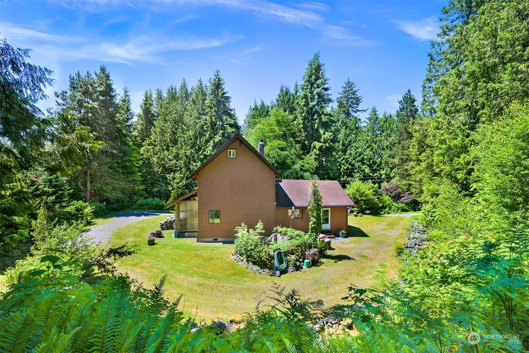 2125 Butler Creek Road Sedro-Woolley, WA 98284 - Photo 32 of 40 a house view with a garden space