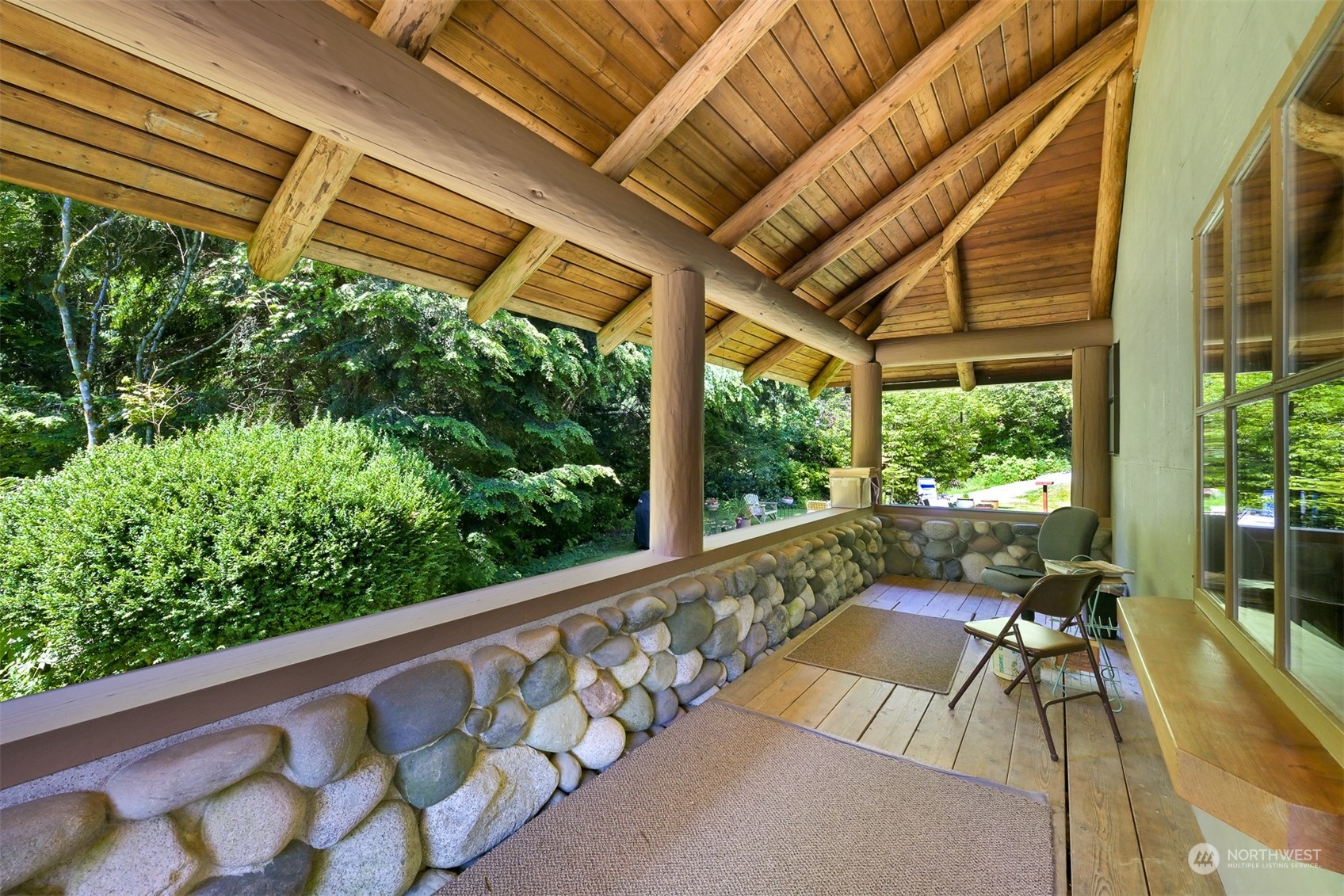 2125 Butler Creek Road Sedro-Woolley, WA 98284 - Photo 6 of 40 a view of balcony with furniture and wooden floor