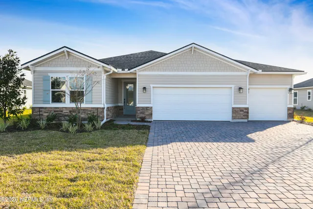 a front view of house with yard