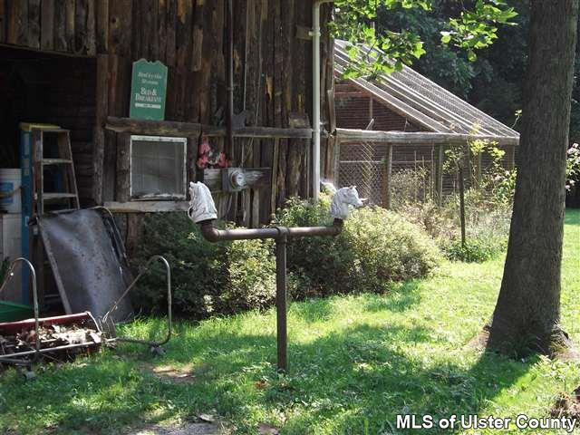 9 George Sickle Road Saugerties, NY 12477 - Photo 15 of 17 a front view of a house with garden