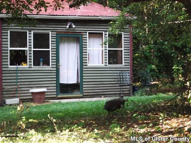 9 George Sickle Road Saugerties, NY 12477 - Photo 16 of 17 a front view of a house with garden