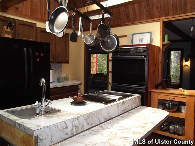 9 George Sickle Road Saugerties, NY 12477 - Photo 5 of 17 a bathroom with a sink and a mirror