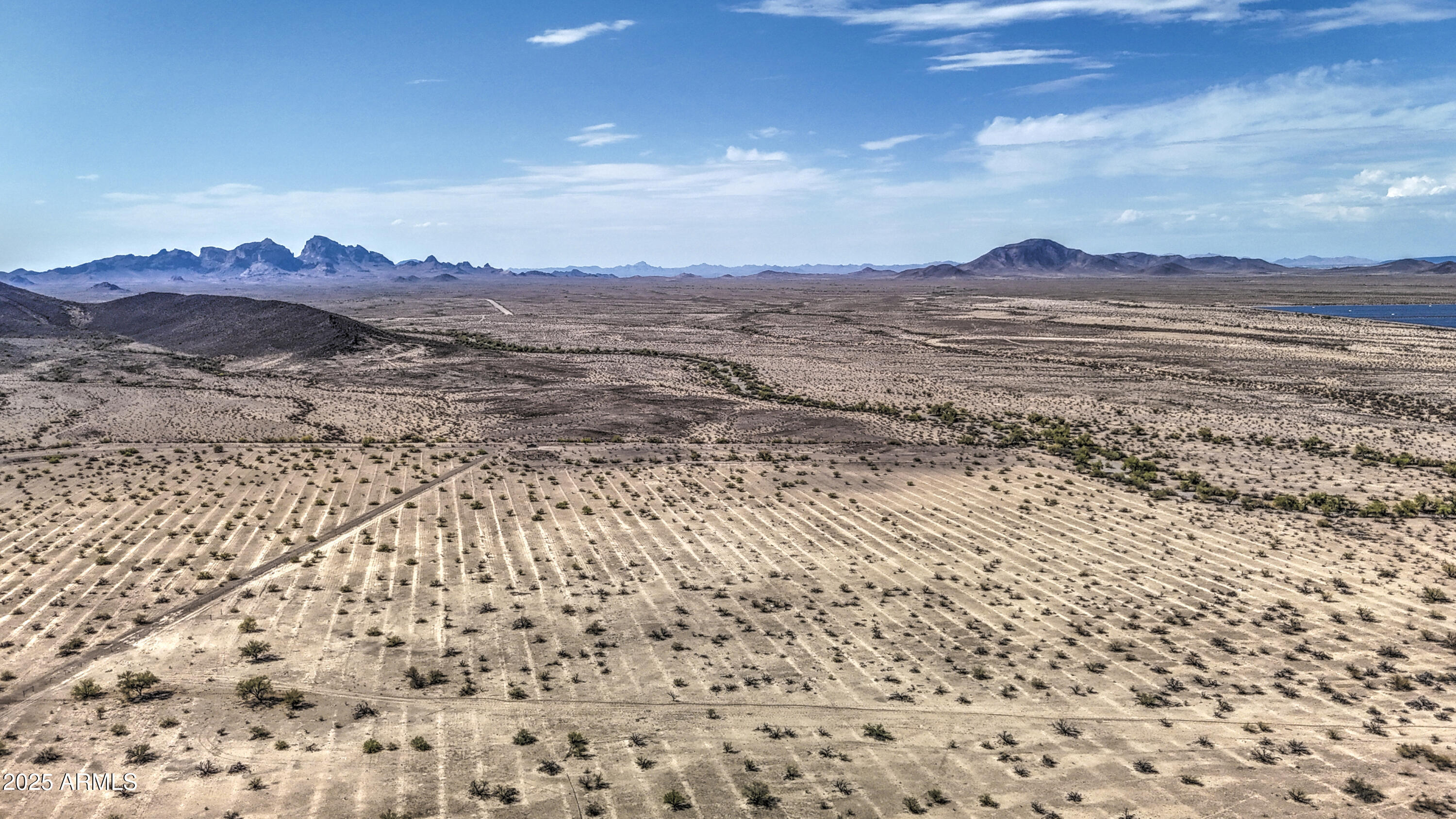 0 West Elliot Road, Unit 40150011A Tonopah, AZ 85354 - Photo 11 of 53 a view of ocean and mountain