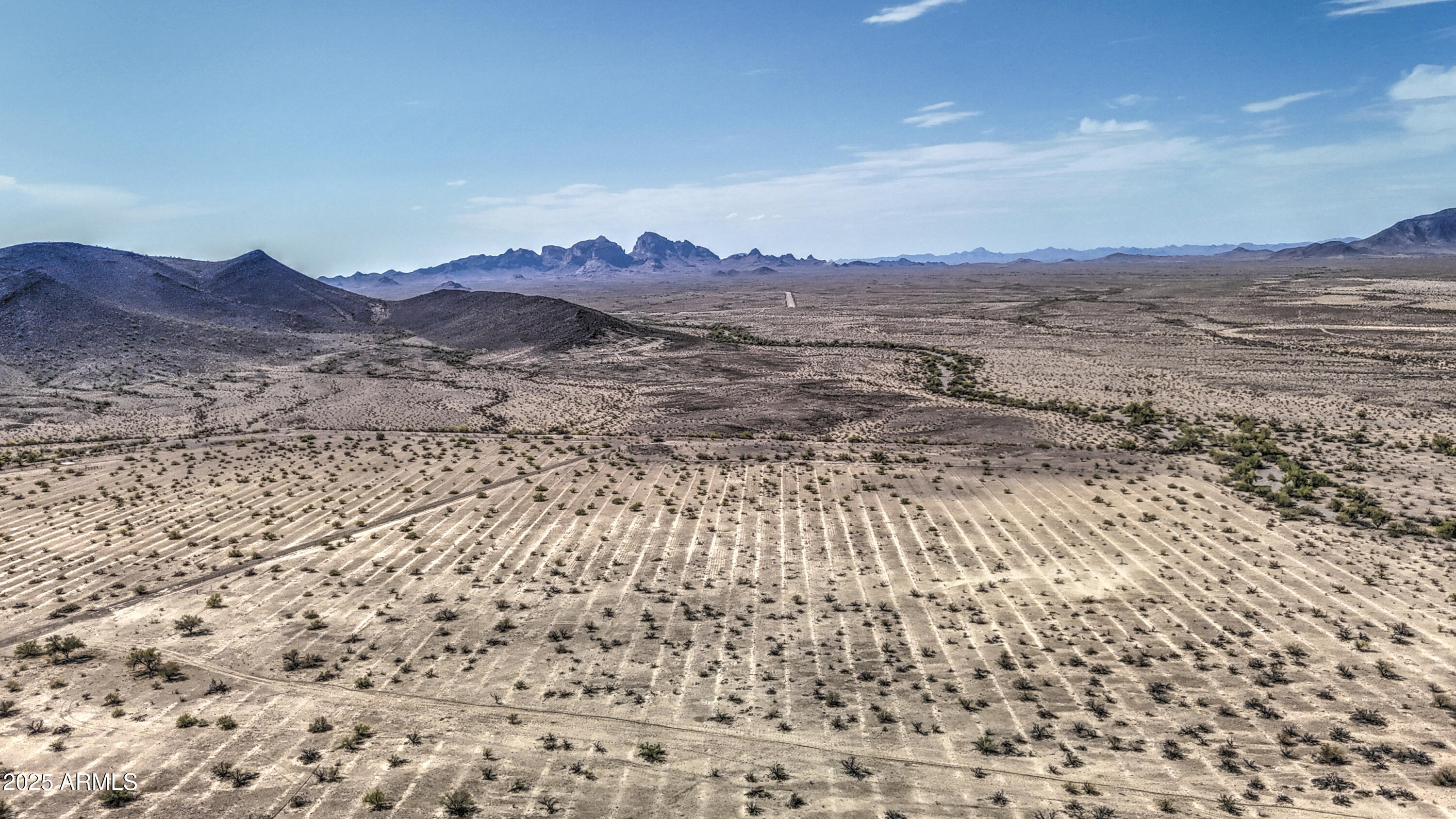 0 West Elliot Road, Unit 40150011A Tonopah, AZ 85354 - Photo 14 of 53 a view of mountain and sunset
