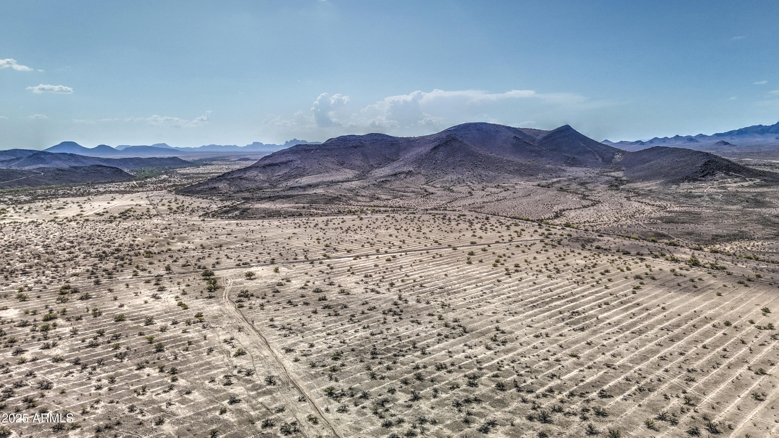 0 West Elliot Road, Unit 40150011A Tonopah, AZ 85354 - Photo 18 of 53 a view of a backyard of a house