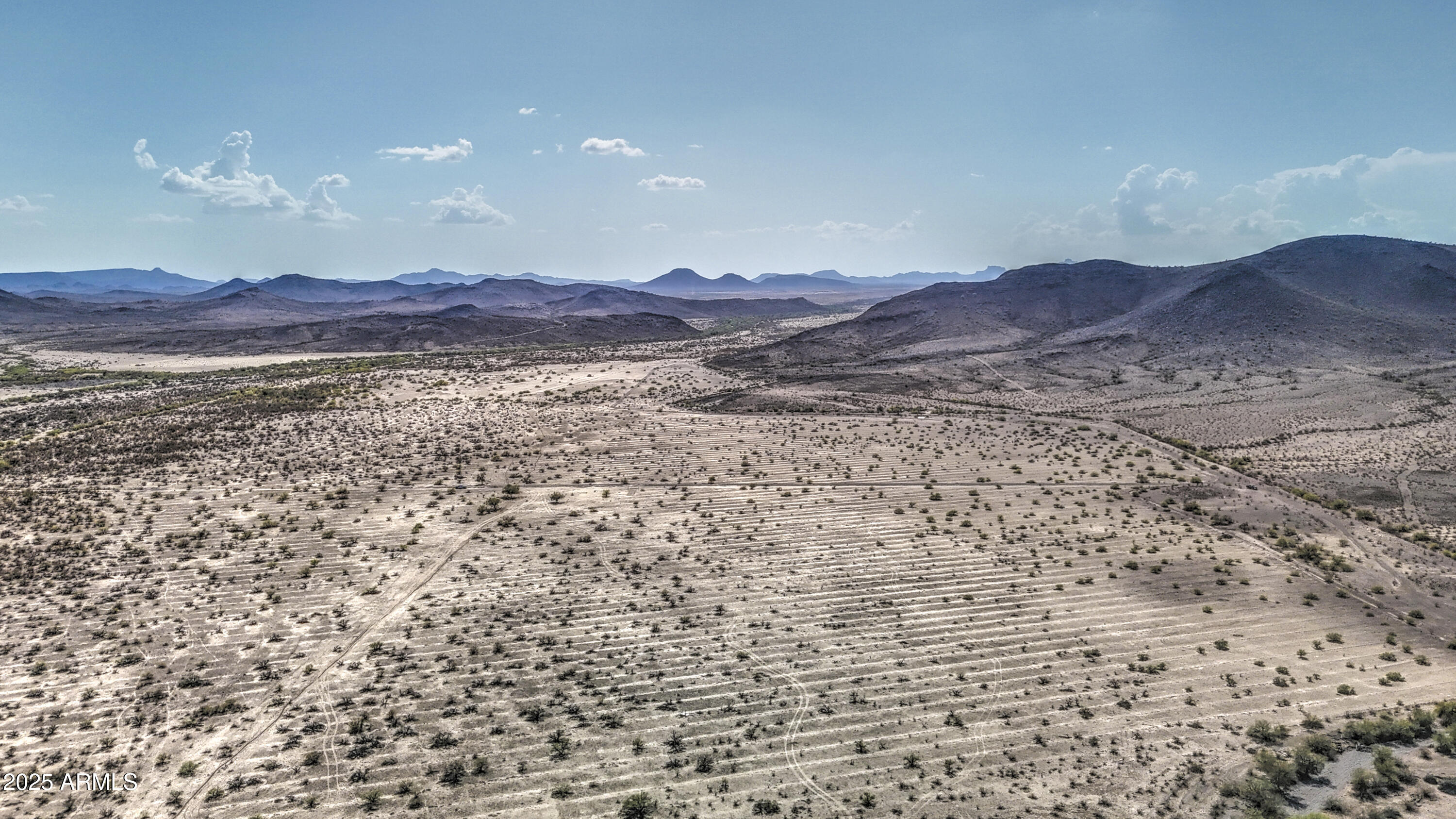 0 West Elliot Road, Unit 40150011A Tonopah, AZ 85354 - Photo 21 of 53 a view of mountain with sunset in background