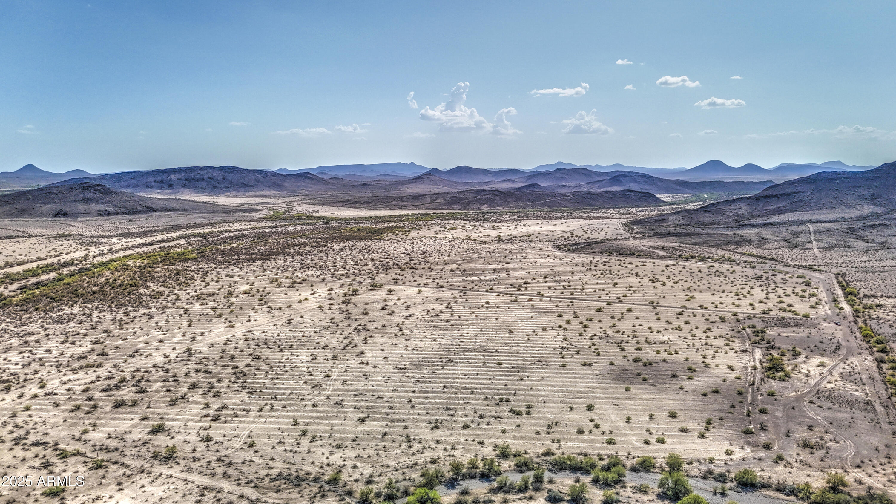 0 West Elliot Road, Unit 40150011A Tonopah, AZ 85354 - Photo 25 of 53 a view of ocean with a mountain