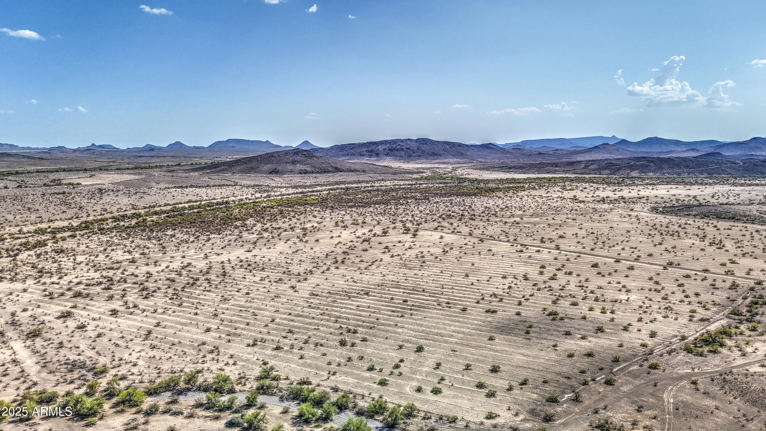 0 West Elliot Road, Unit 40150011A Tonopah, AZ 85354 - Photo 28 of 53 a view of ocean and a mountain