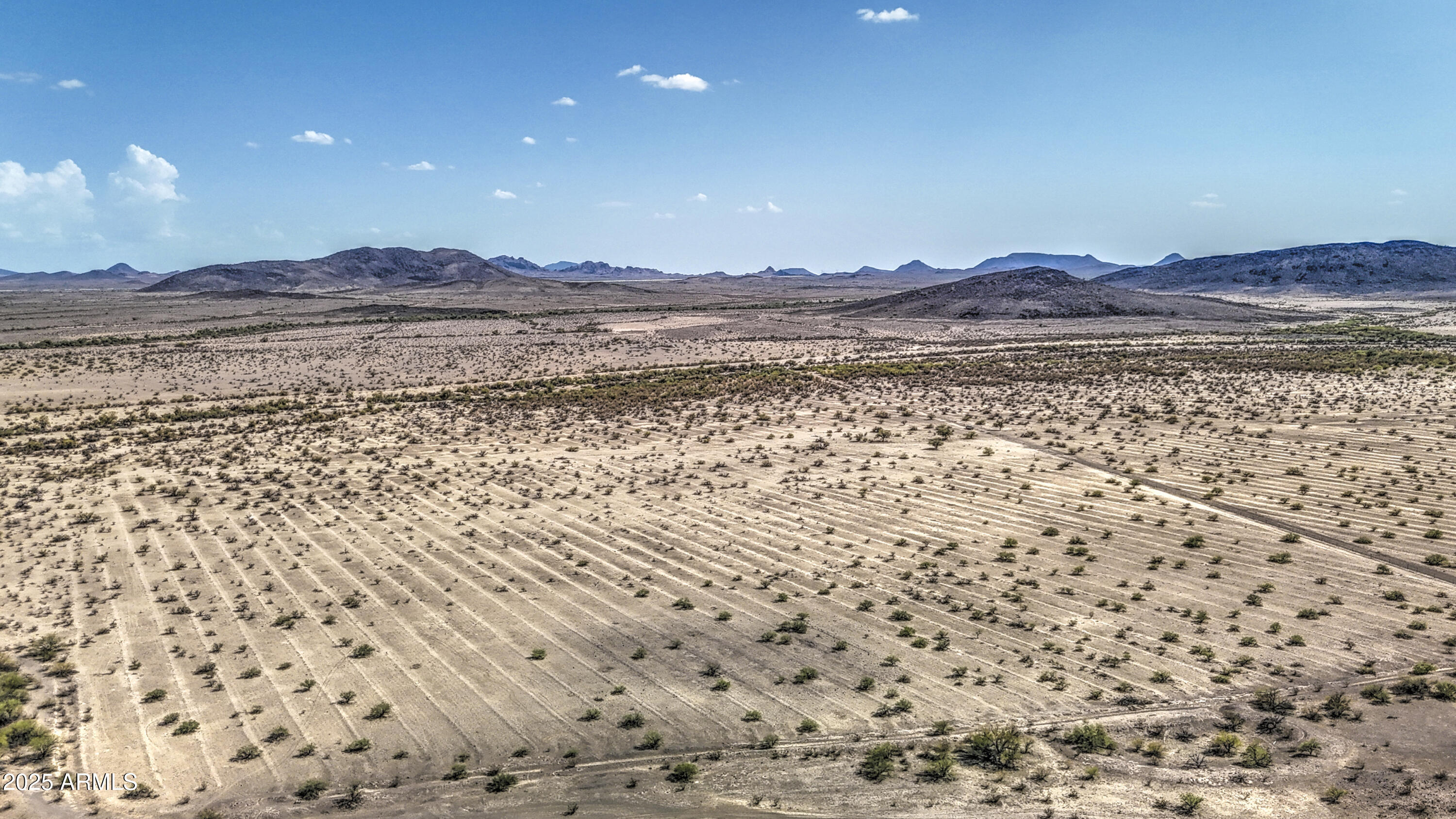 0 West Elliot Road, Unit 40150011A Tonopah, AZ 85354 - Photo 34 of 53 a view of lake and mountain in the background