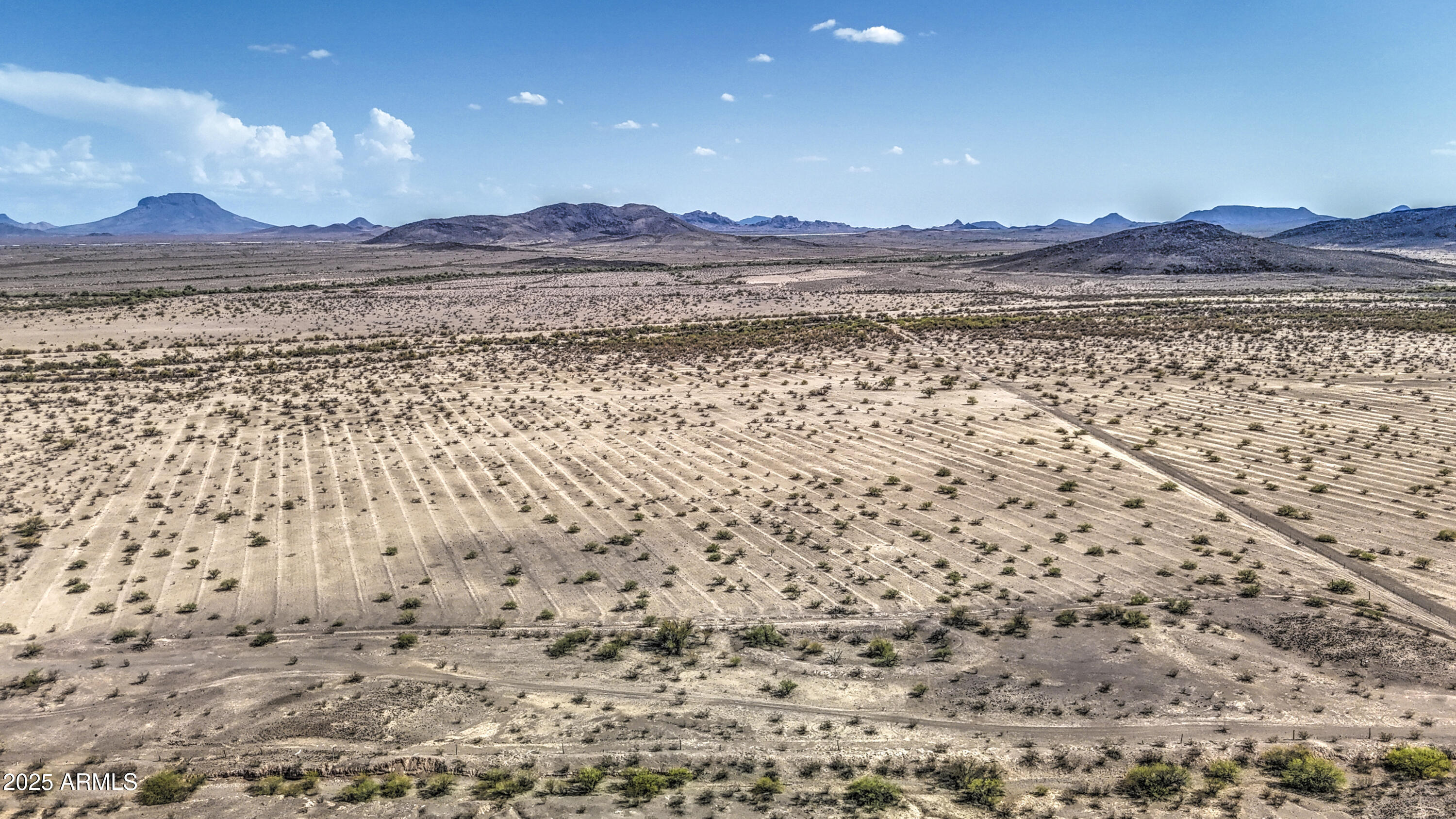 0 West Elliot Road, Unit 40150011A Tonopah, AZ 85354 - Photo 36 of 53 a view of mountain with sunset view