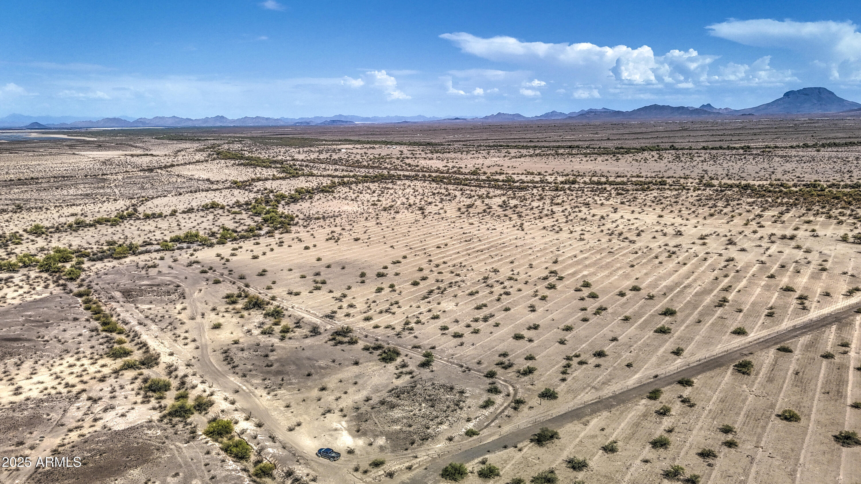 0 West Elliot Road, Unit 40150011A Tonopah, AZ 85354 - Photo 43 of 53 a view of a sky from a city