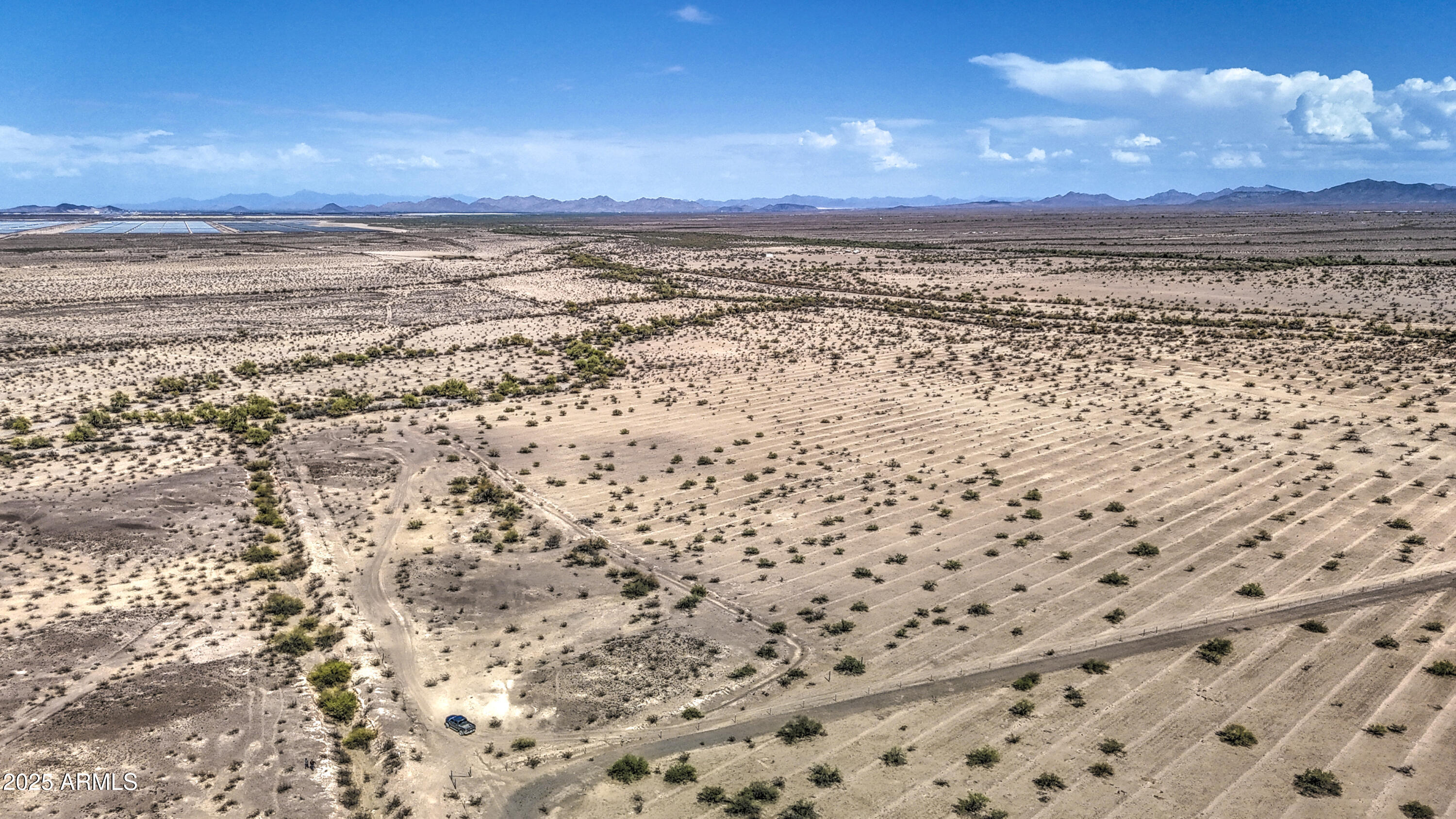0 West Elliot Road, Unit 40150011A Tonopah, AZ 85354 - Photo 44 of 53 a view of an ocean beach