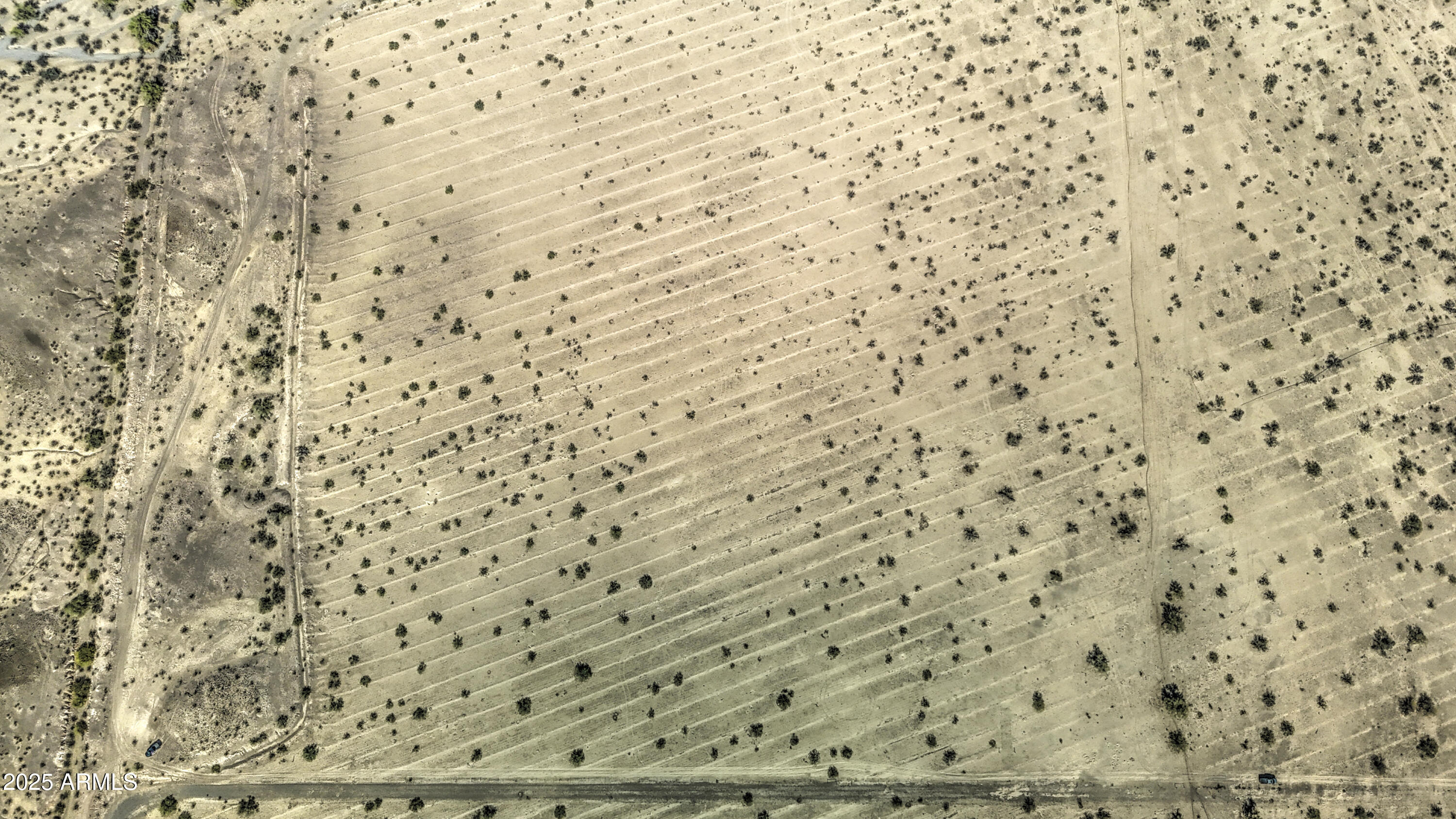 0 West Elliot Road, Unit 40150011A Tonopah, AZ 85354 - Photo 49 of 53 a bathroom with a shower curtain