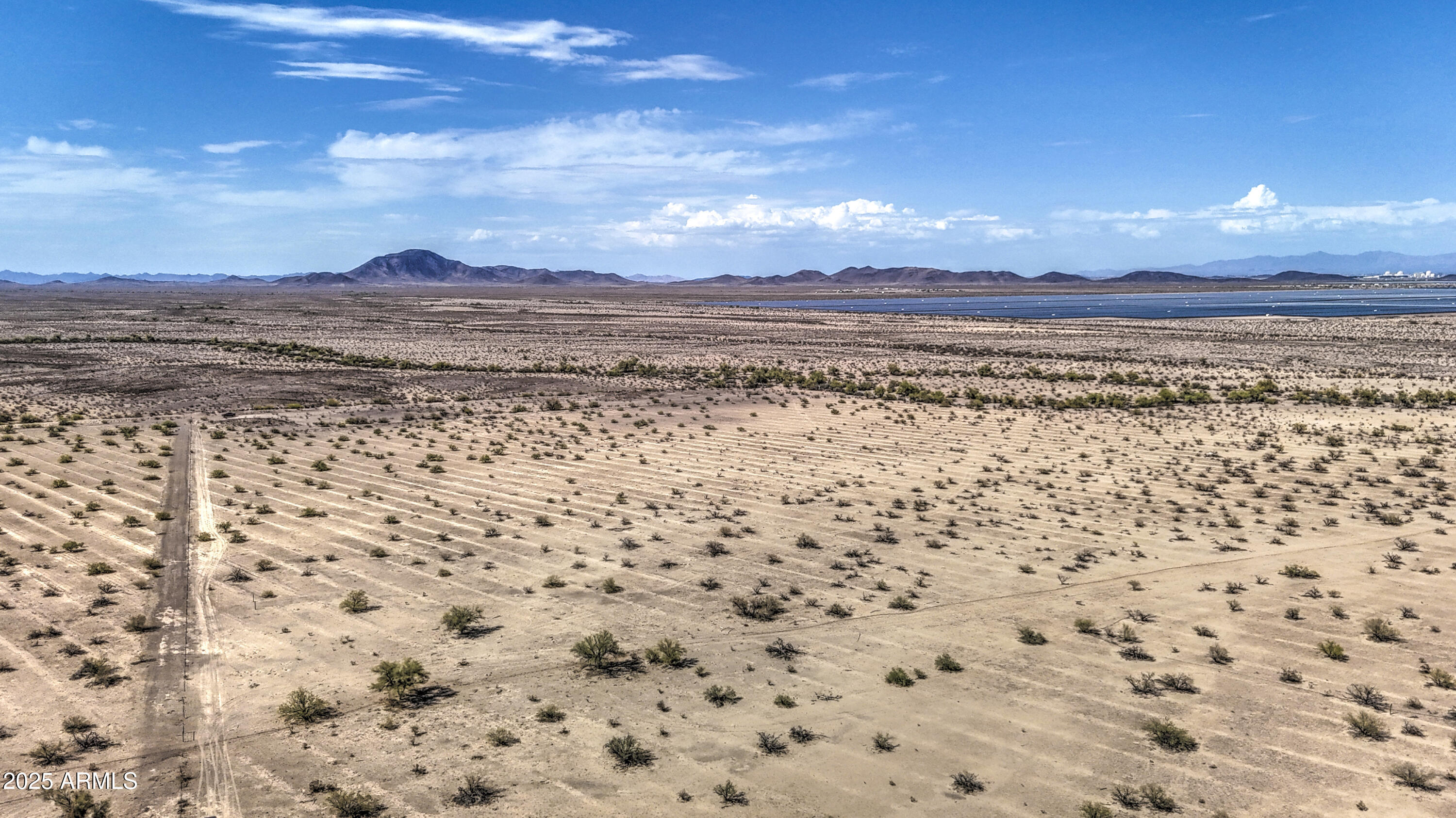 0 West Elliot Road, Unit 40150011A Tonopah, AZ 85354 - Photo 6 of 53 a view of a pathway with a ocean view