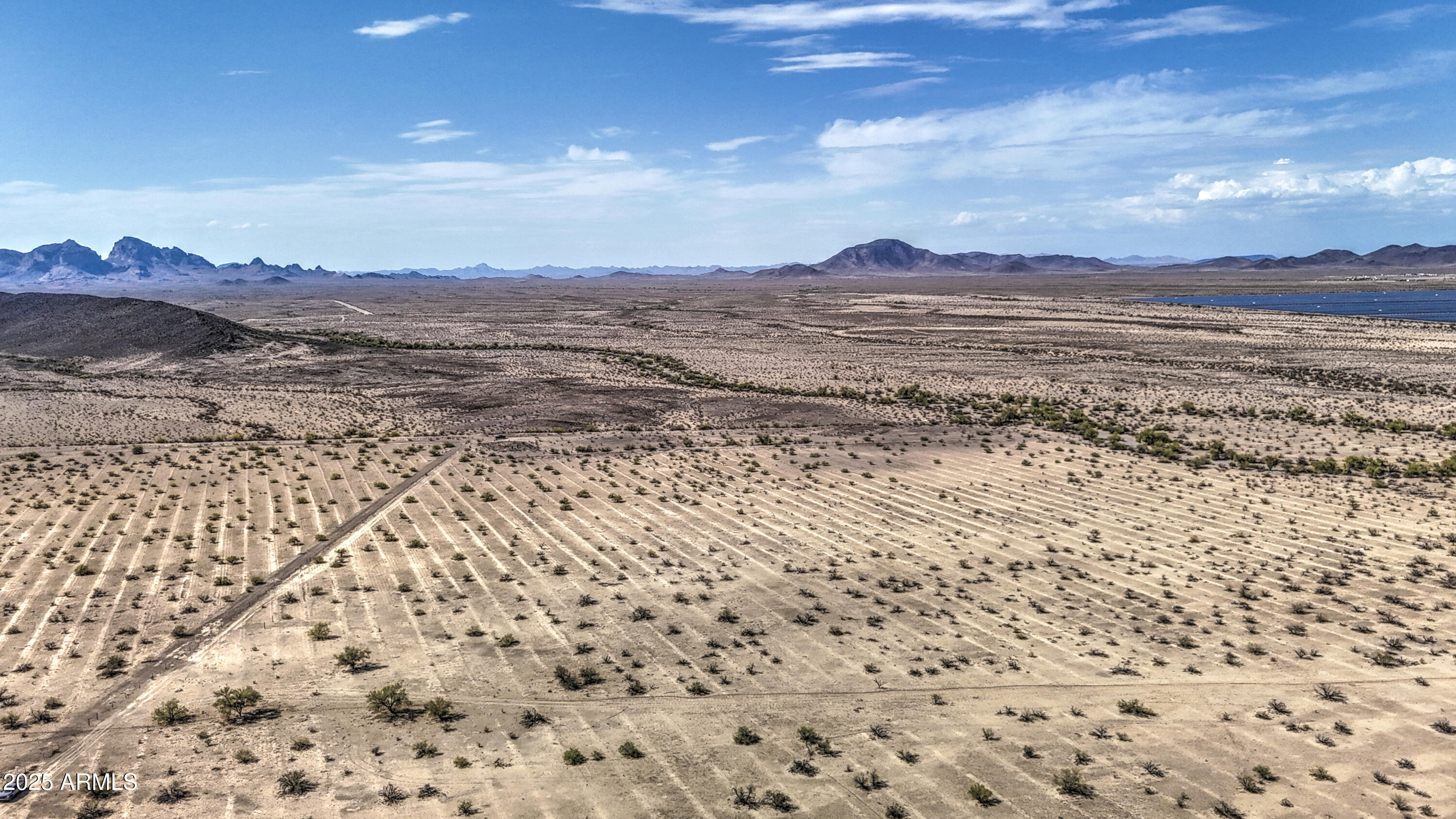 0 West Elliot Road, Unit 40150011A Tonopah, AZ 85354 - Photo 9 of 53 a view of lake and mountain