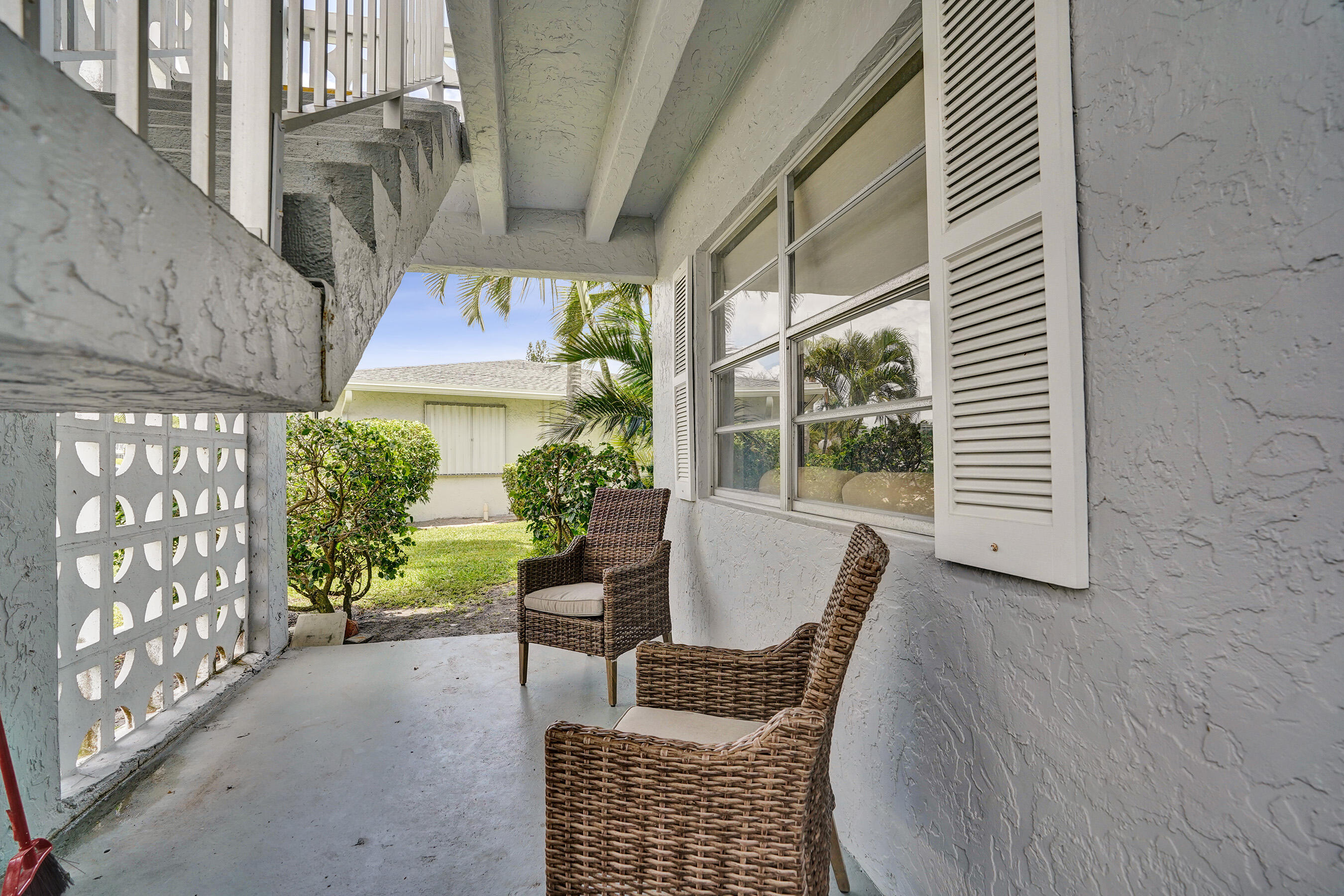 2820 Southwest 13th Street, Unit 101 Delray Beach, FL 33445 - Photo 19 of 83 Front patio