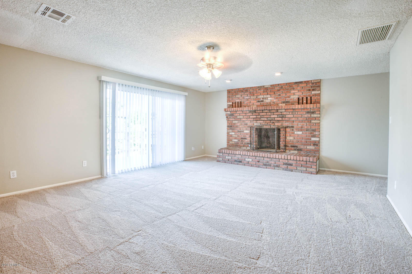 8244 West Osborn Road Phoenix, AZ 85033 - Photo 14 of 24 Master Bedroom with Fireplace