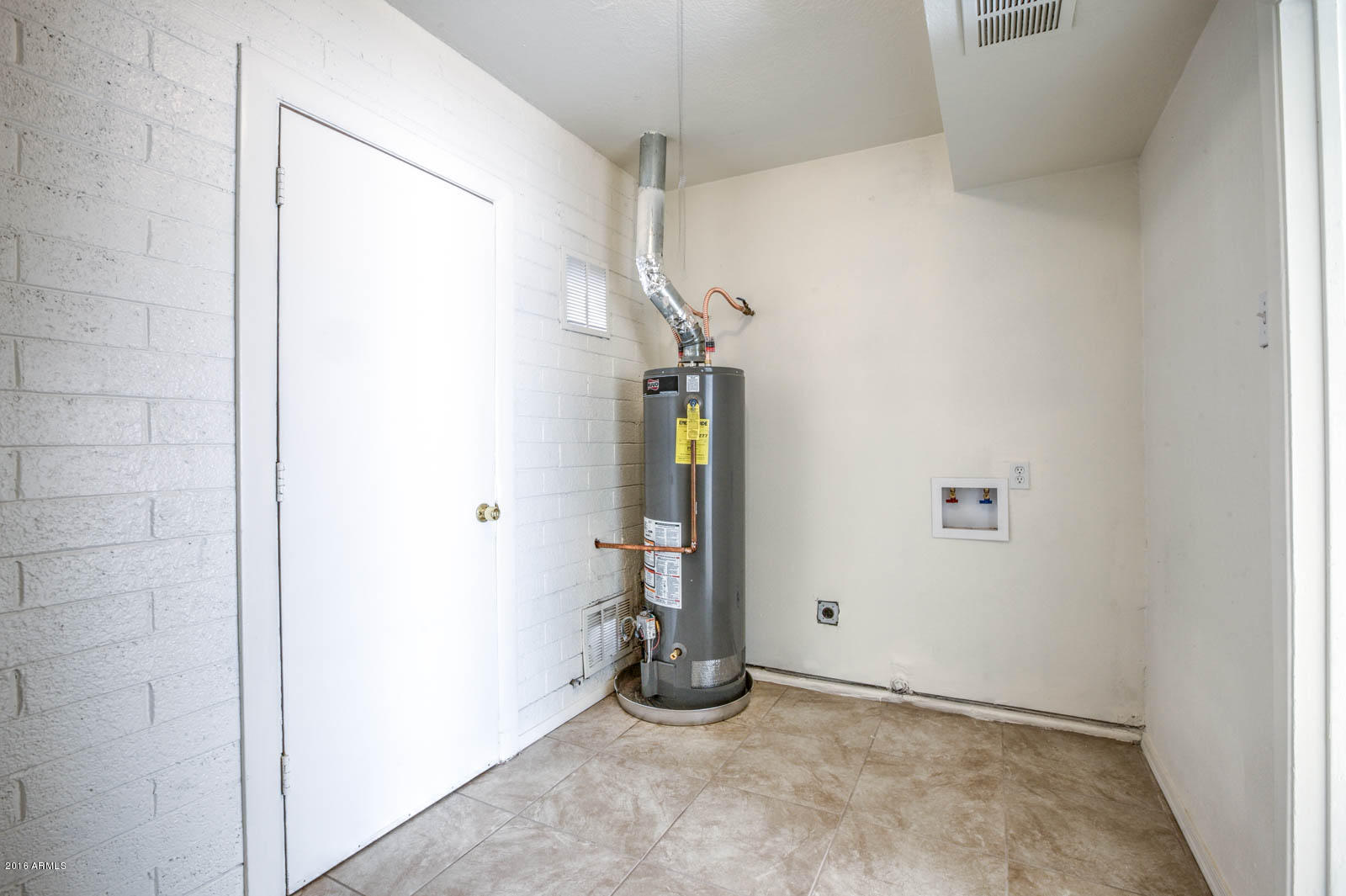 8244 West Osborn Road Phoenix, AZ 85033 - Photo 22 of 24 Inside Laundry