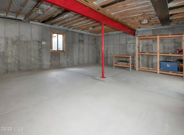 a view of a room with wooden walls
