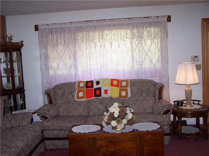 554 Hill Road Georgetown, PA 15043 - Photo 5 of 17 Living Room. Nice flow from the Living room, dining room, and kitchen, great for entertaining
