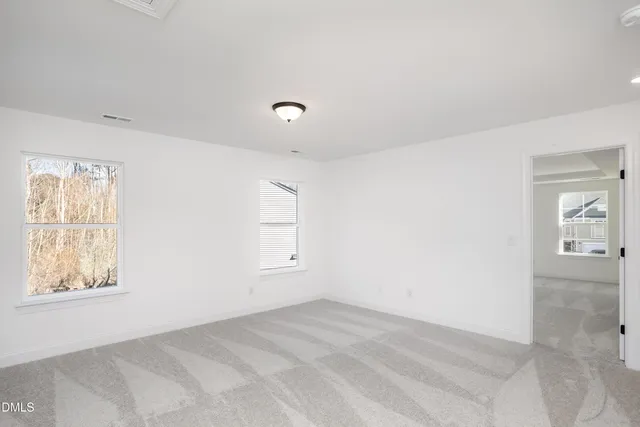 a view of a room that has a window in it