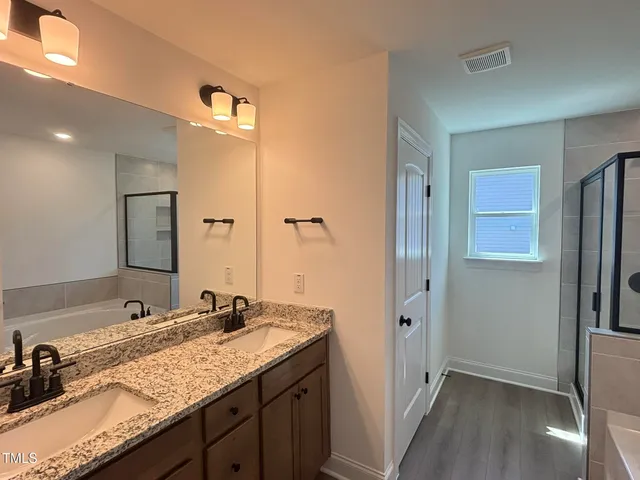 an empty room with windows and windows