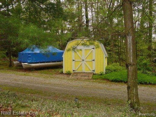 2605 Fry Road Highland, MI 48357 - Photo 13 of 22 shed