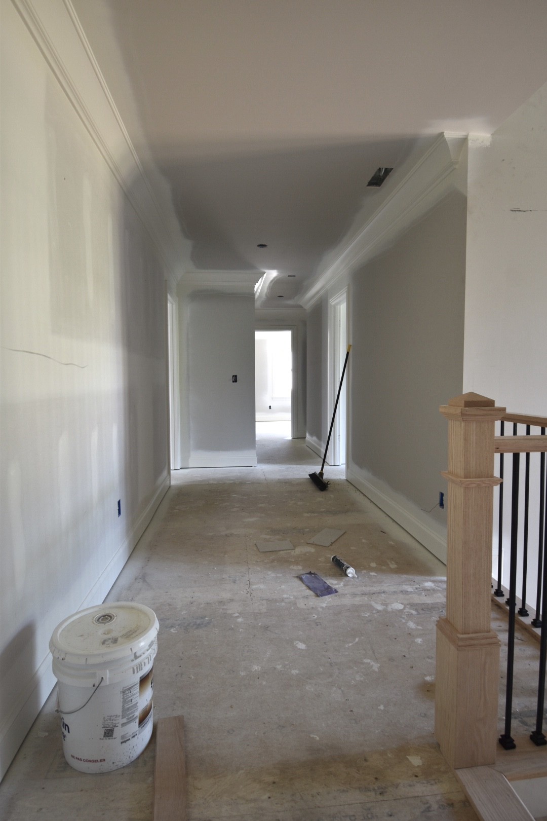 5013 Wallaby Drive Spring Hill, TN 37174 - Photo 22 of 25 a view of a hallway with two chair and a potted plant
