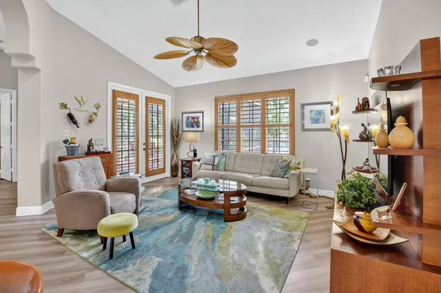 a bedroom with a bed and flat screen tv