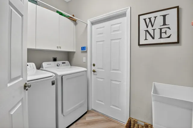 a view of a brick building with many windows