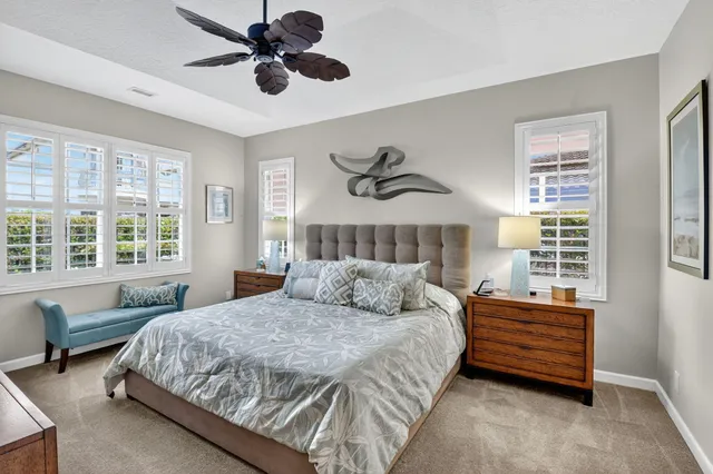 a bathroom with a double vanity sink mirror and double