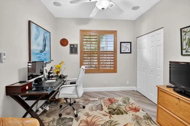 a view of a chairs and table in the patio
