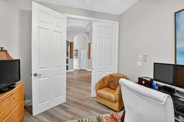 a view of a pathway both side of house