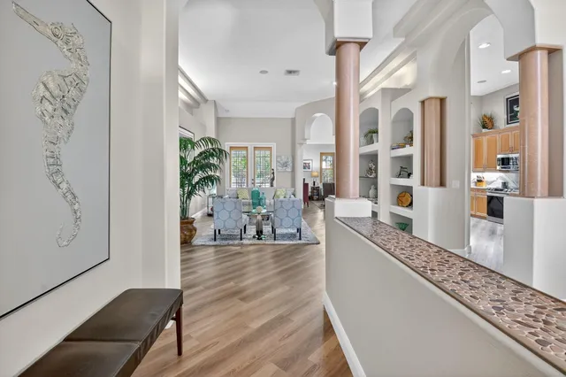 a view of a livingroom with furniture and front door