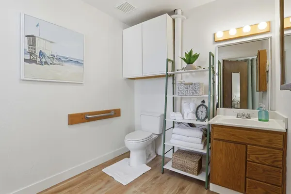 a bathroom with a glass shower door