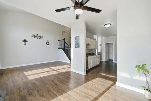 a view of a livingroom with wooden floor
