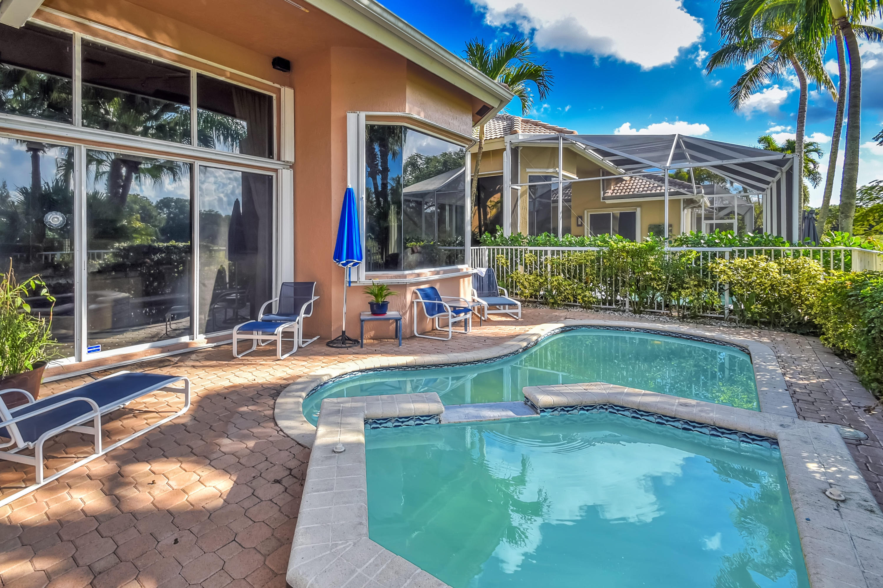 4153 Northwest 53rd Street Boca Raton, FL 33496 - Photo 29 of 56 Back yard view with Pool