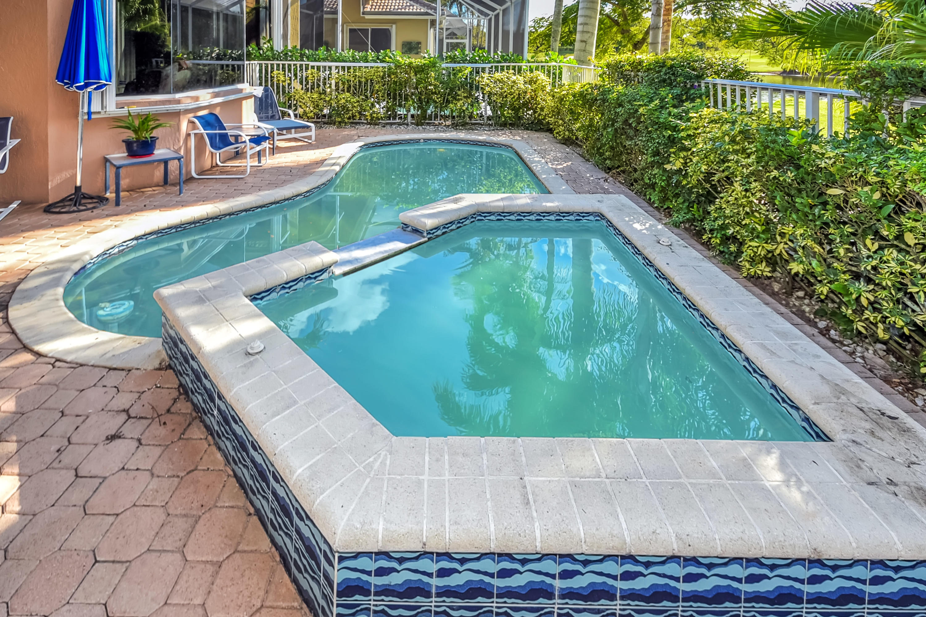 4153 Northwest 53rd Street Boca Raton, FL 33496 - Photo 31 of 56 Pool with Jacuzzi